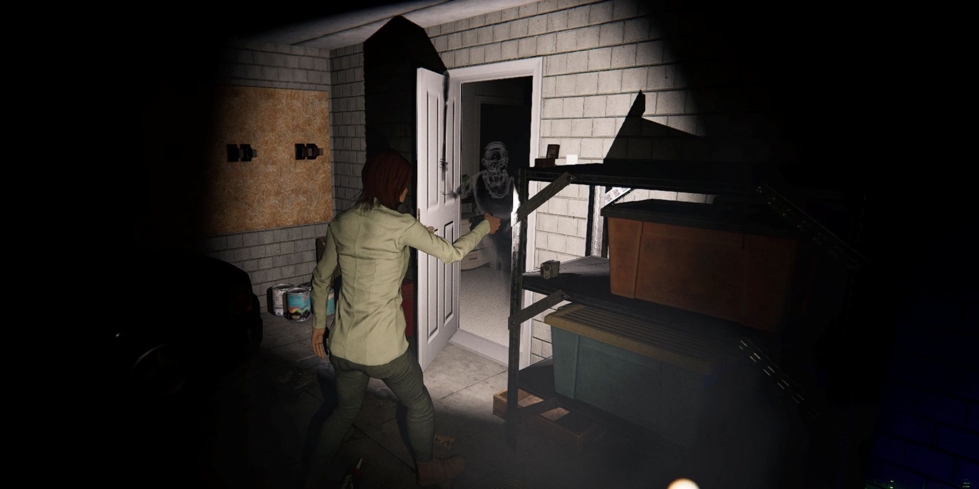 Phasmophobia player stood in front of a ghost apparition in the doorway