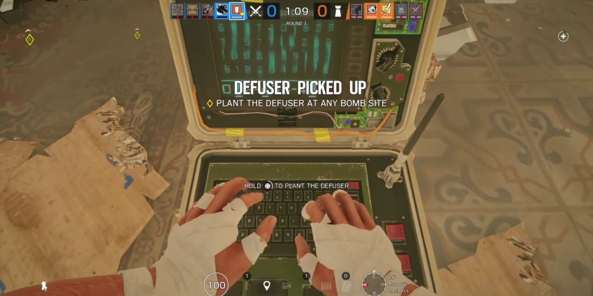 Player planting defuser in Rainbow Six Siege