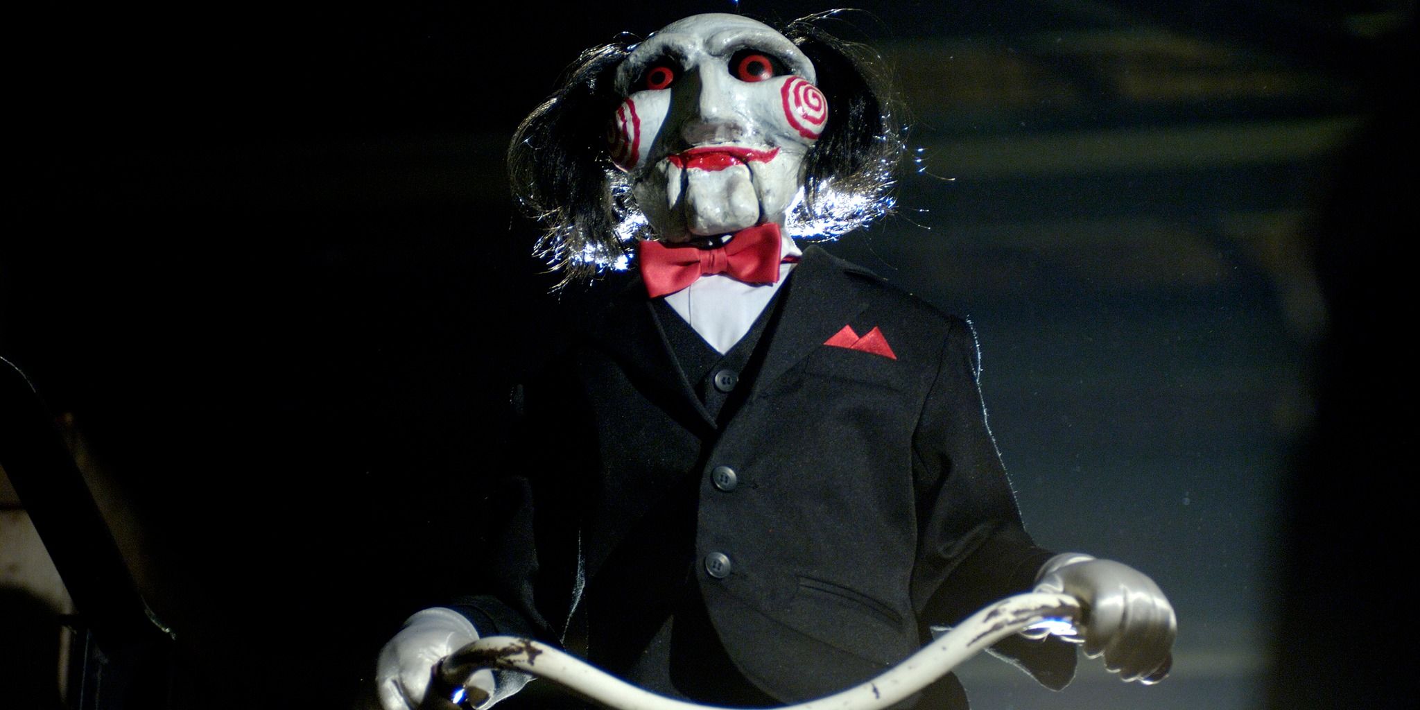 SAW 2 - Billy the puppet riding a tricycle
