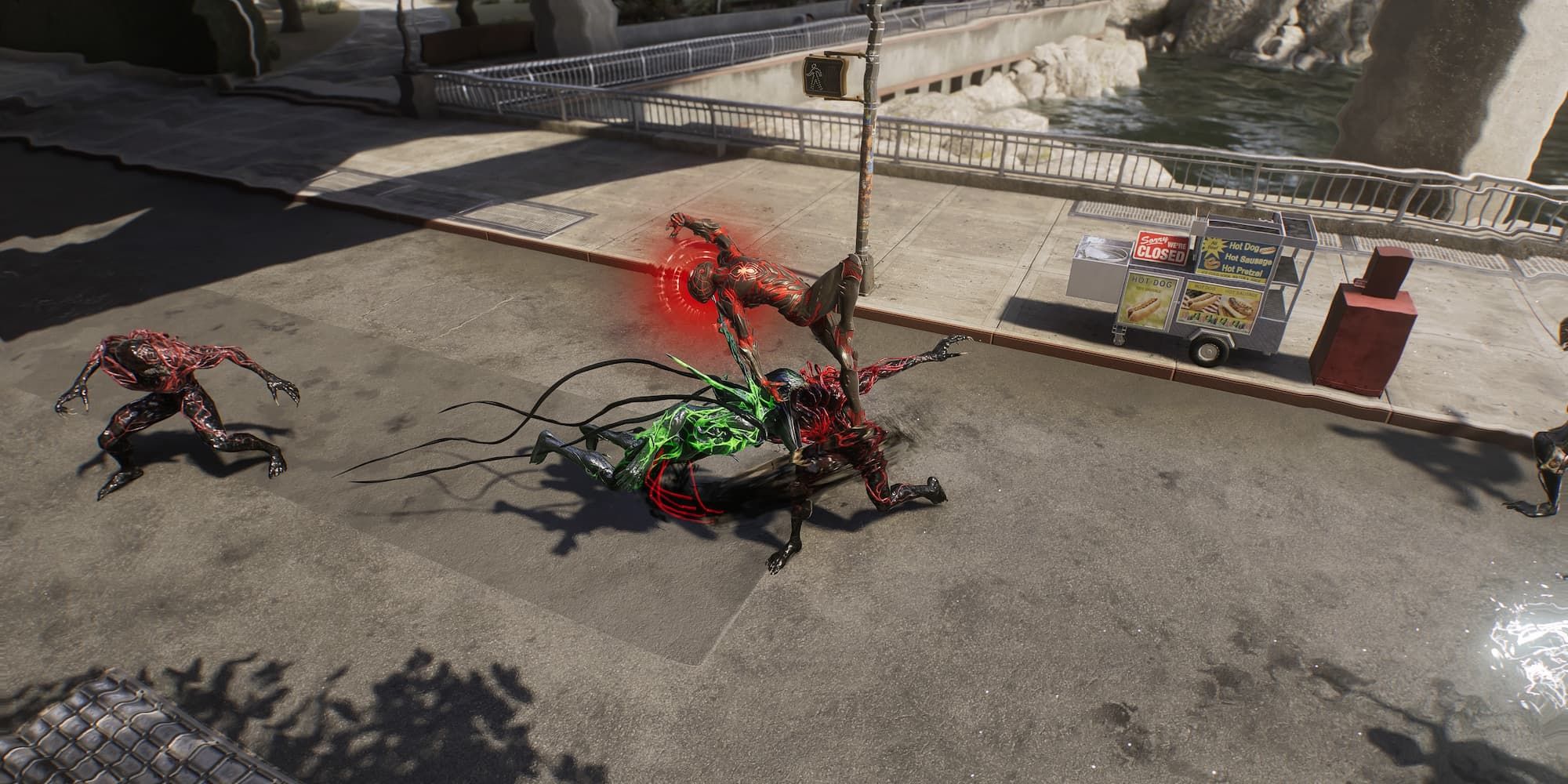 Spider-Man jumps over two symbiote enemies to dodge their attacks in Spider-Man 2.