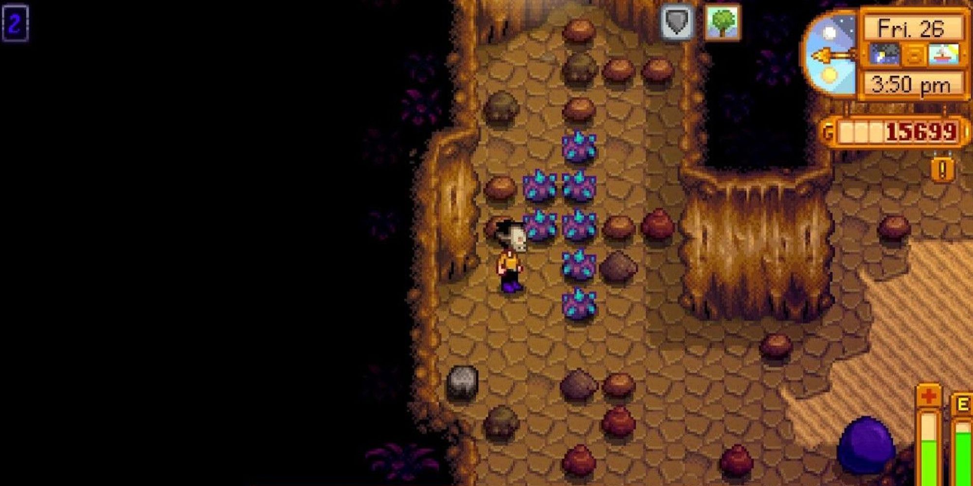 stardew valley player standing next to cluster of iridium nodes