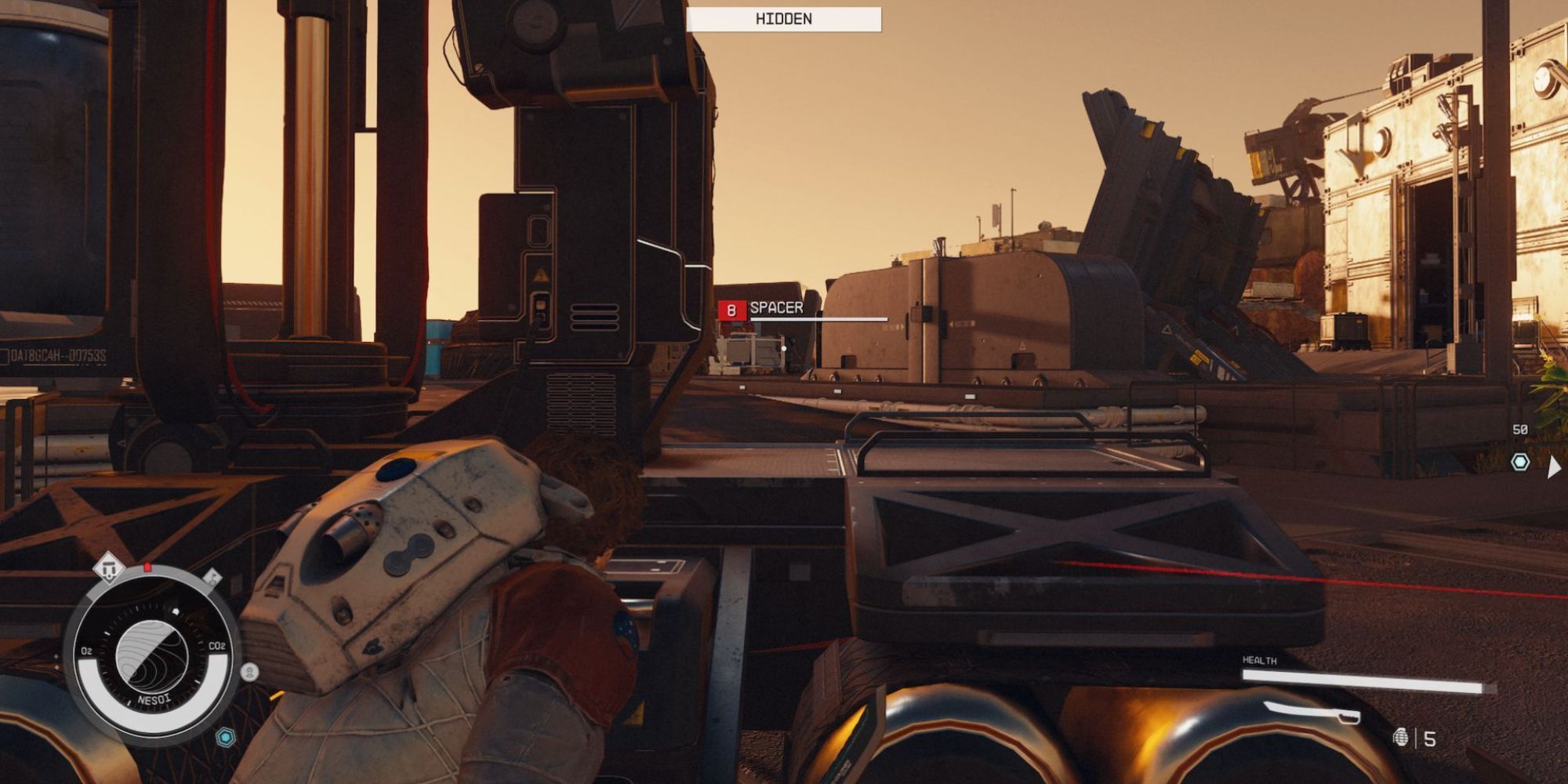Starfield character crouched behind crates