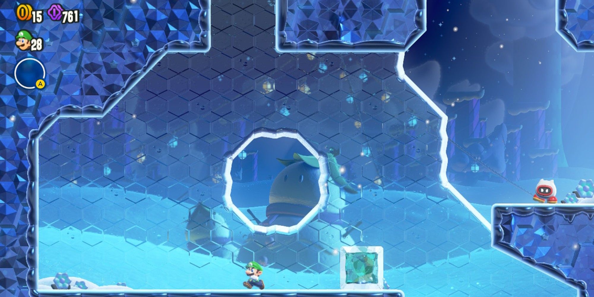 Luigi next to an ice block kicked by an Outmaway.
