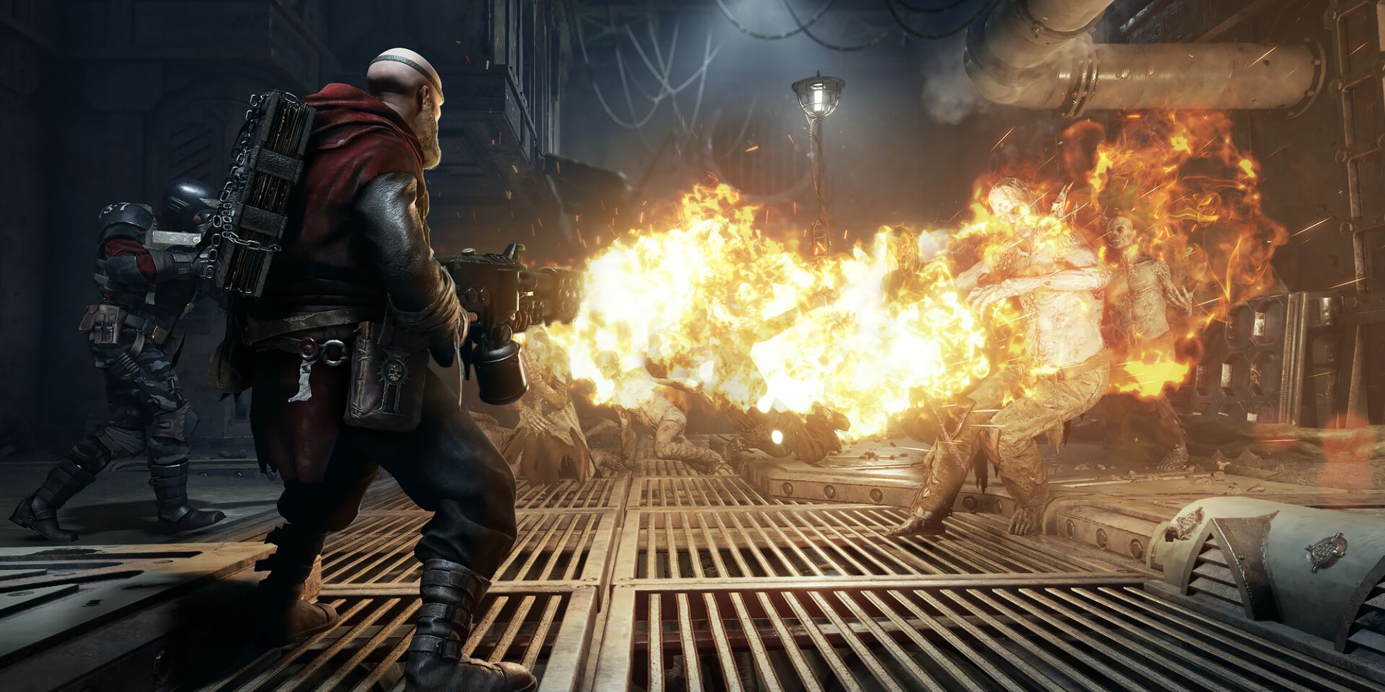 an operative uses a flamer to kill enemies in warhammer 40k: darktide