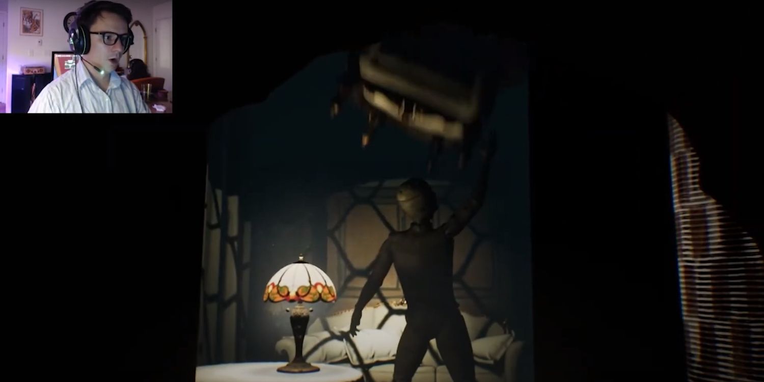 Youtube footage of a man with glasses playing a horror game