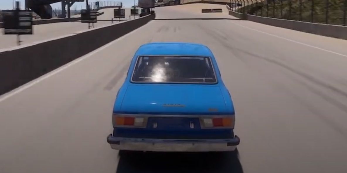 1974 Toyota Corolla SR5 racing toward the finish line forza motorsport