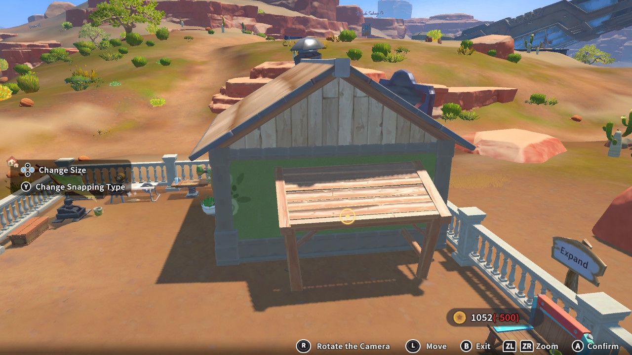 Player character in the building mode within Construction Junction Catalog and adding a large wooden canopy to the outside of their house in My Time At Sandrock.