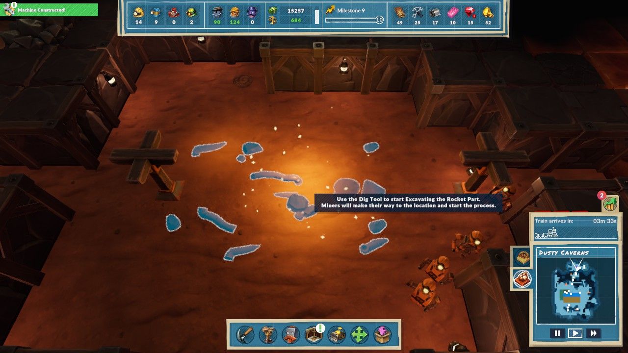 A set of Rocket Parts lying in the dirt next to two Pillars and several Miner Steambots go past it in Dusty Caverns in Steamworld Build.