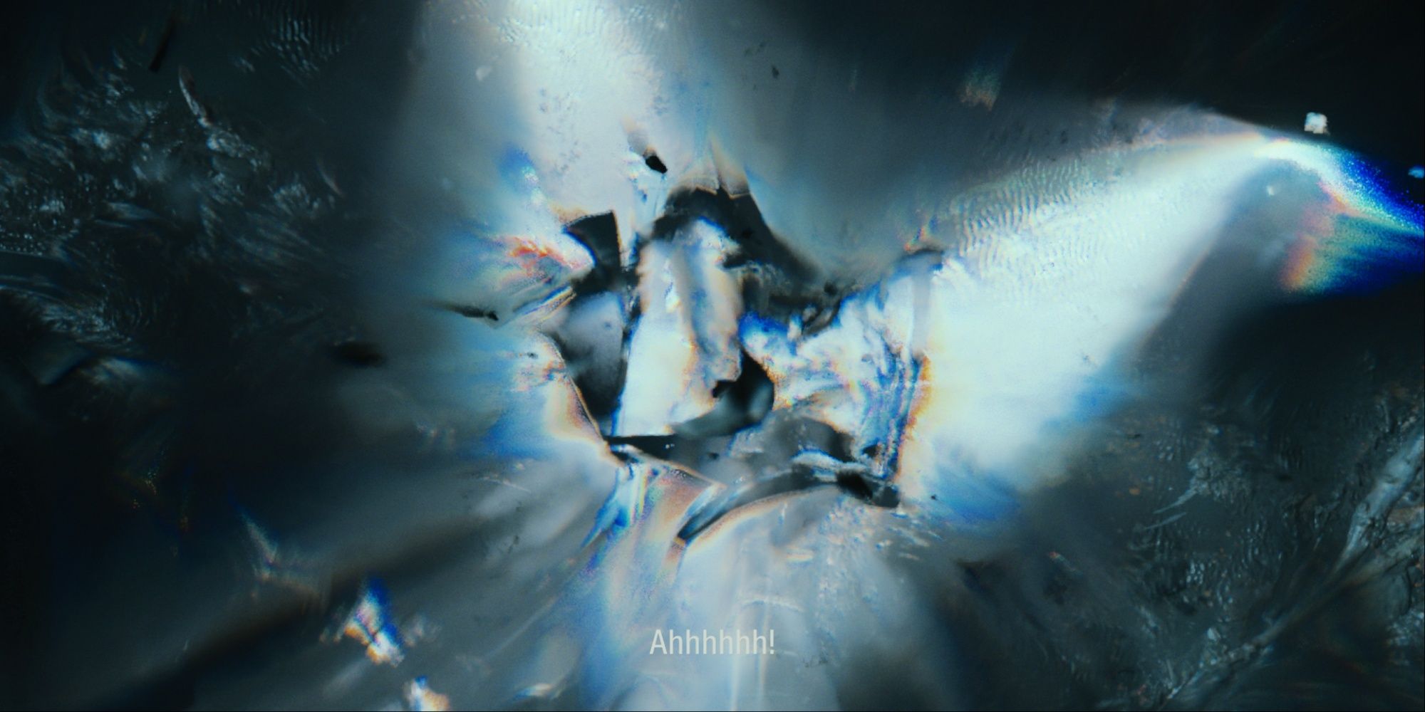 A trapped Scratch inside the FBC cage that explodes with light beams surrounding it.