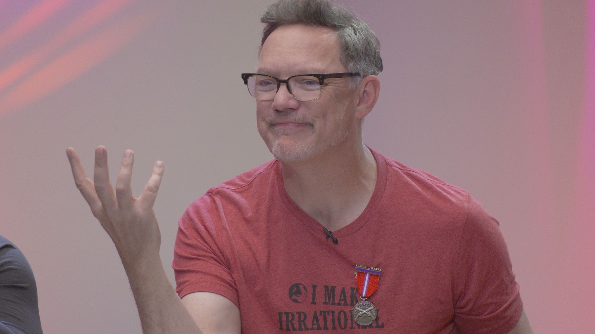 Matthew Lillard sitting at the table on set of Faster Purple Worm! Kill! Kill!