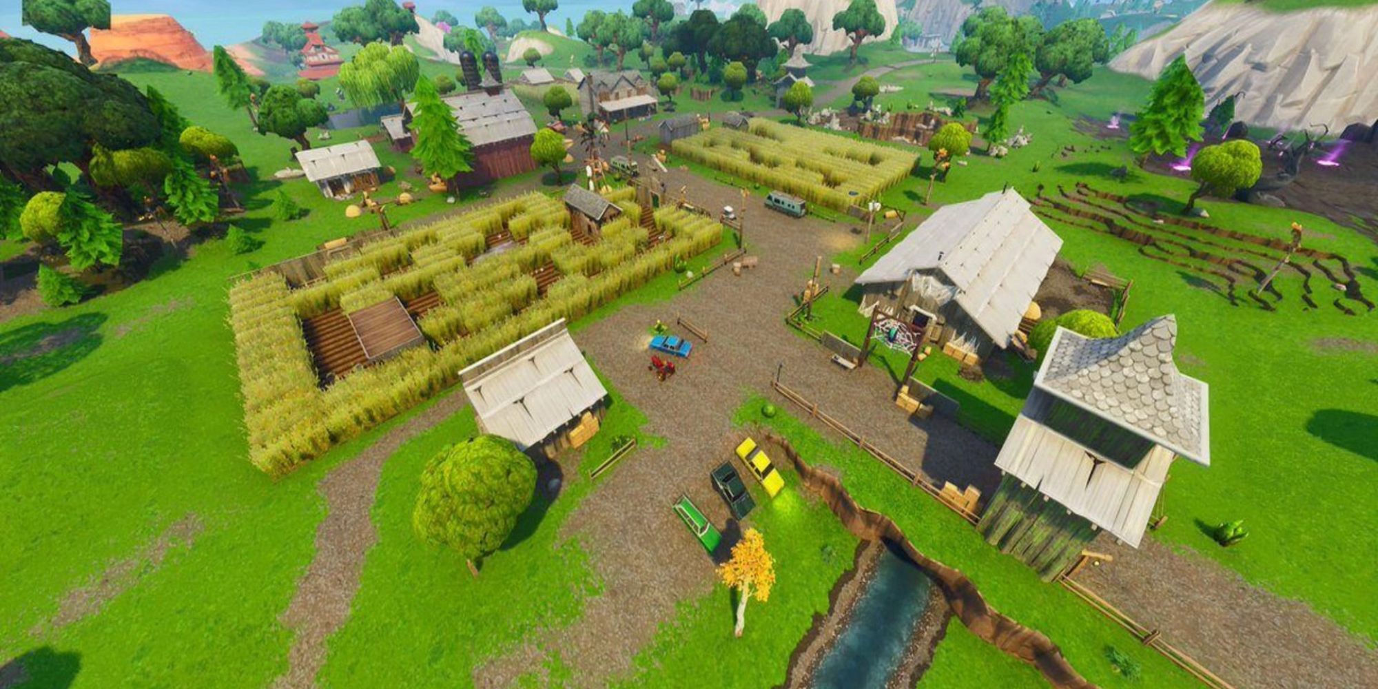 An image from Fortnite Chapter 4 Season 5 of the  Fatal Fields POI, whidch is made up of barns and farmland.