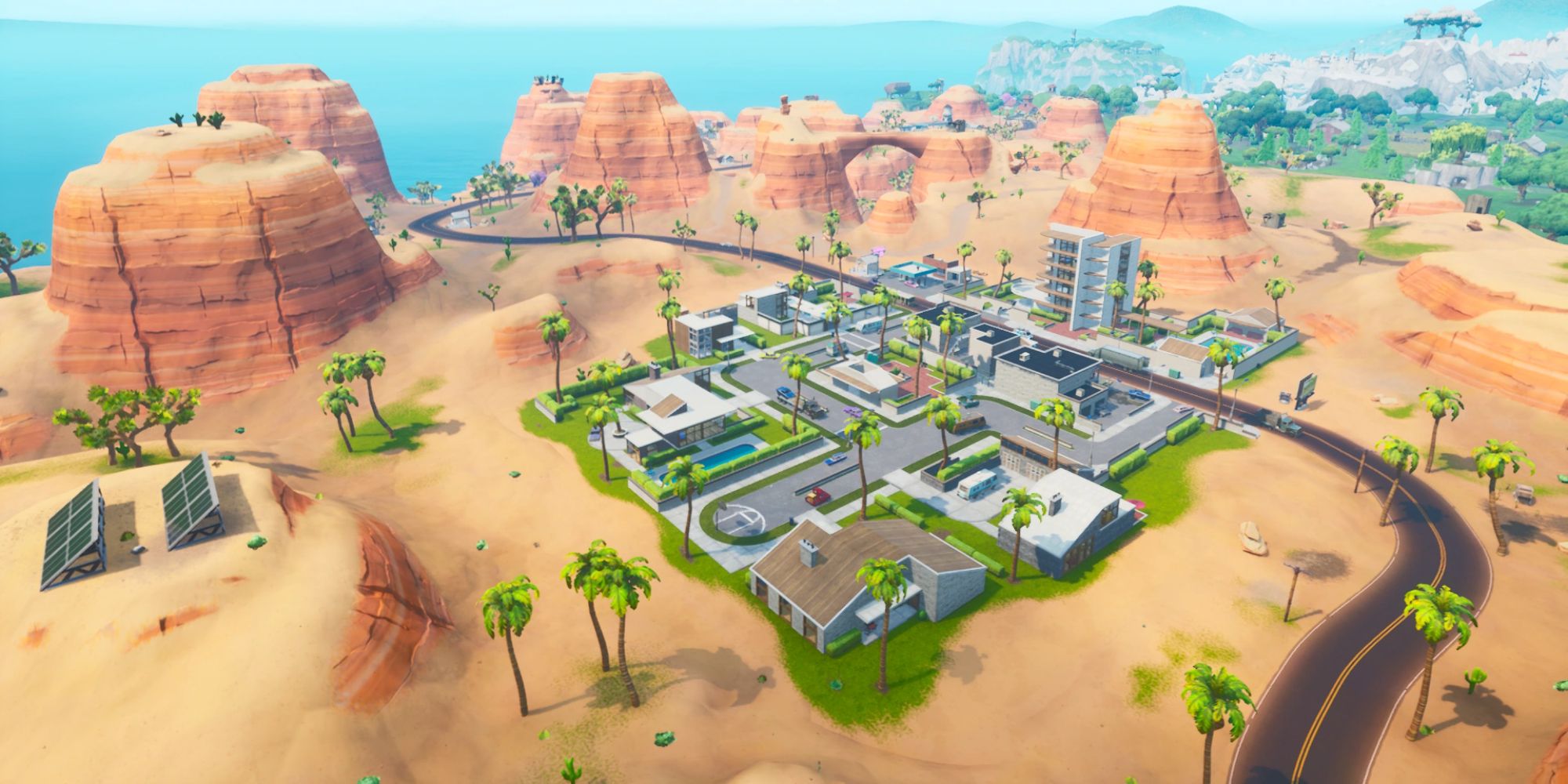 An image from Fortnite Chapter 4 Season 5 of the Paradise Palms POI, which features modern buildings in the middle of the desert.
