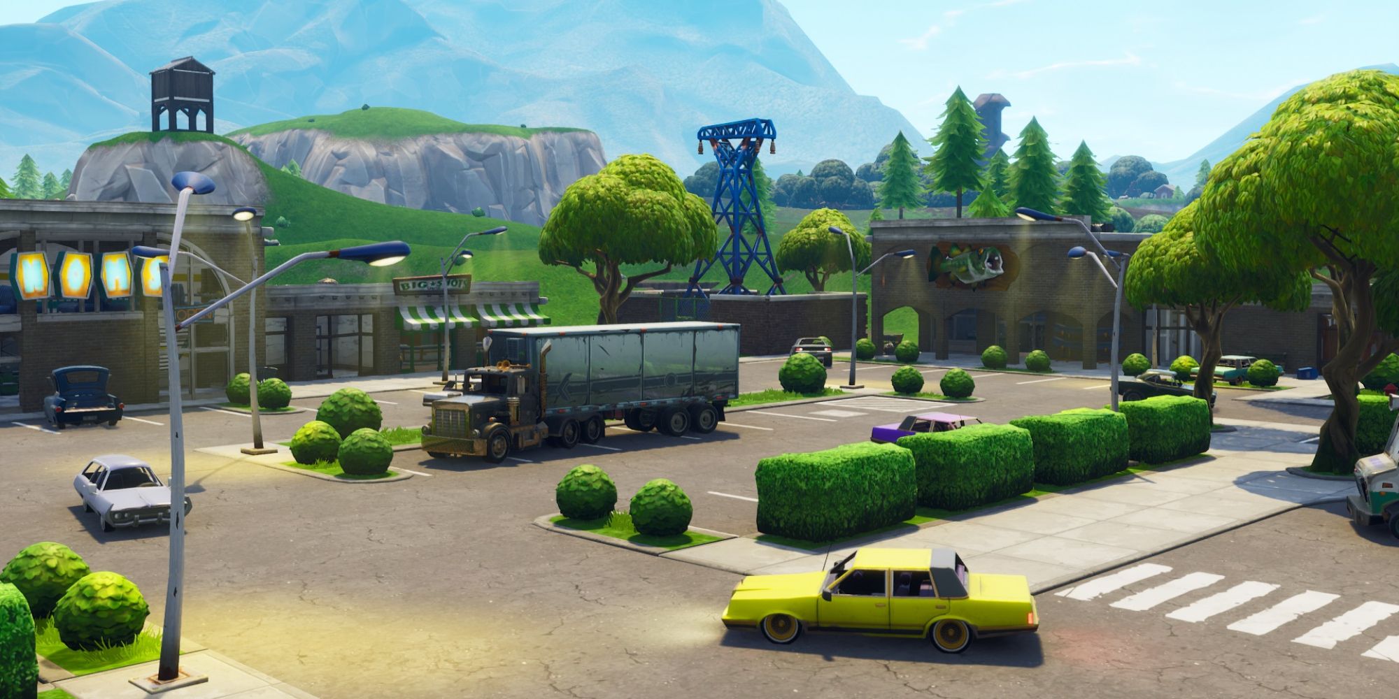 An image from Fortnite Chapter 4 Season 5 of the Retail Row POI, which features several stores in a strip mall. 