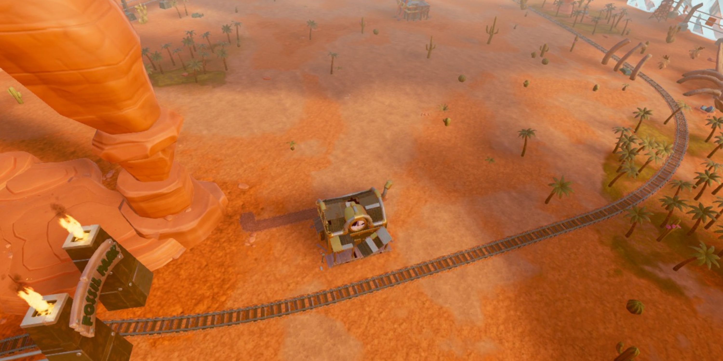 Aerial view of the Fossil Park map, showing off its tropical forests, large bones, and Jurassic-Park inspired gates in Steamworld Build.