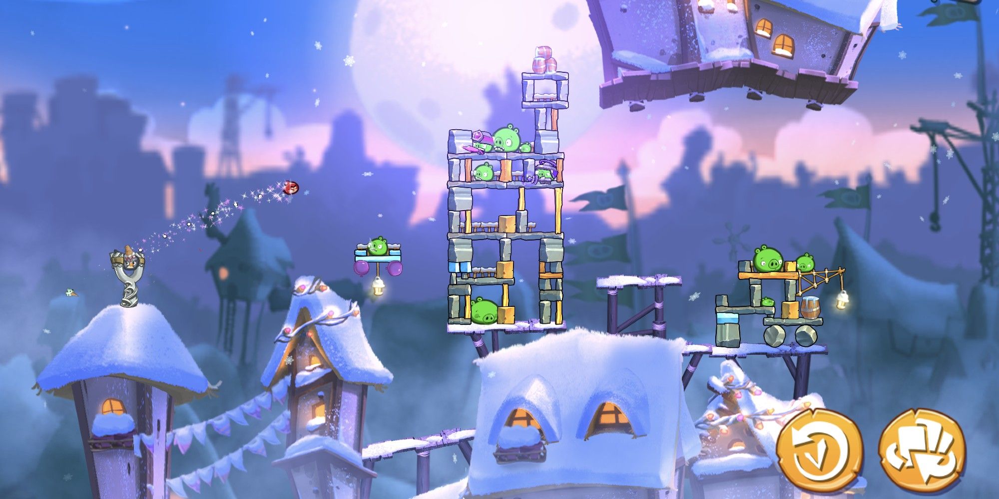 Red bird being slingshot at tower of pigs in a snowy village.