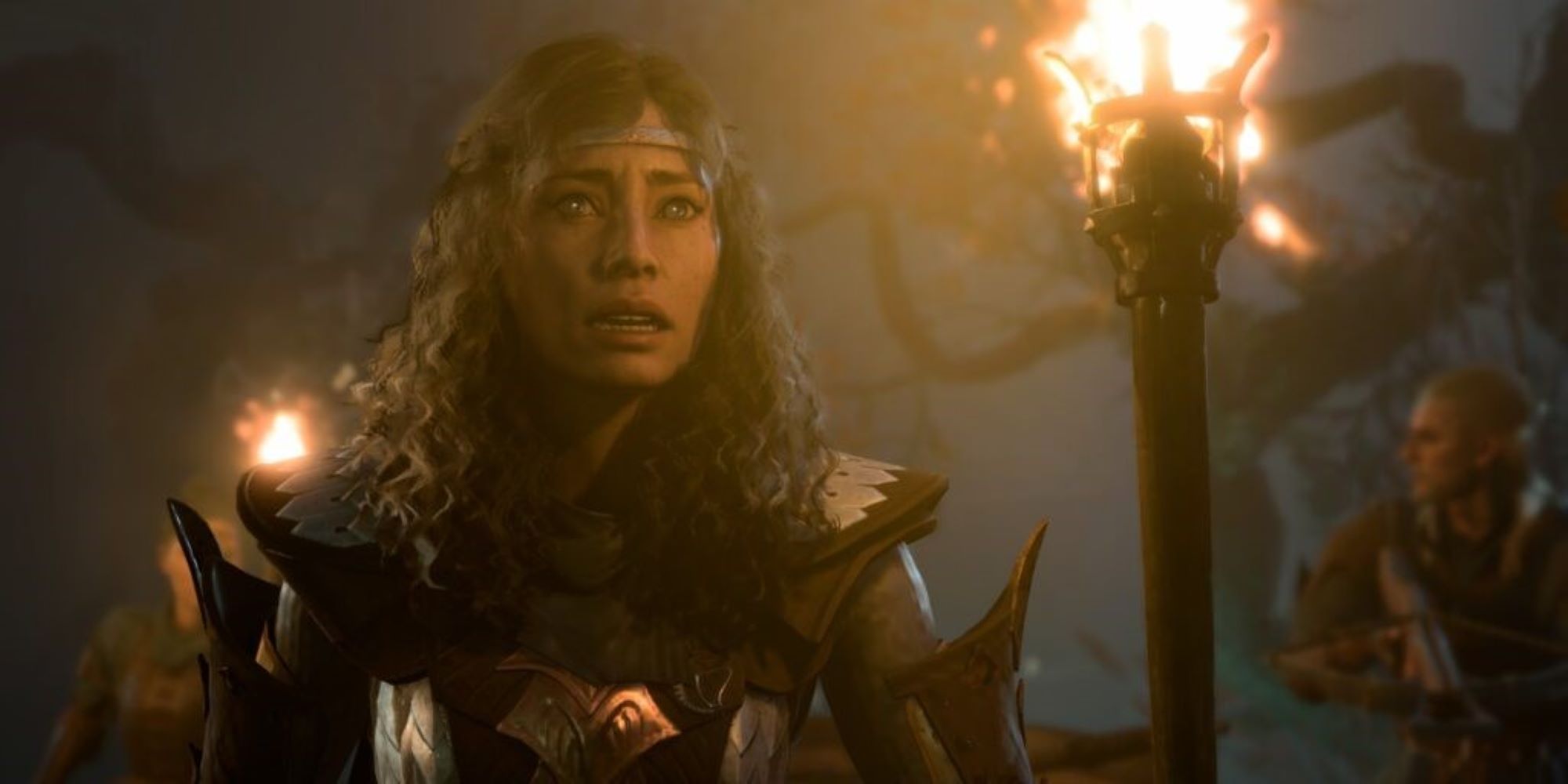 Harper Lassandra holding a torch in Baldur's Gate 3
