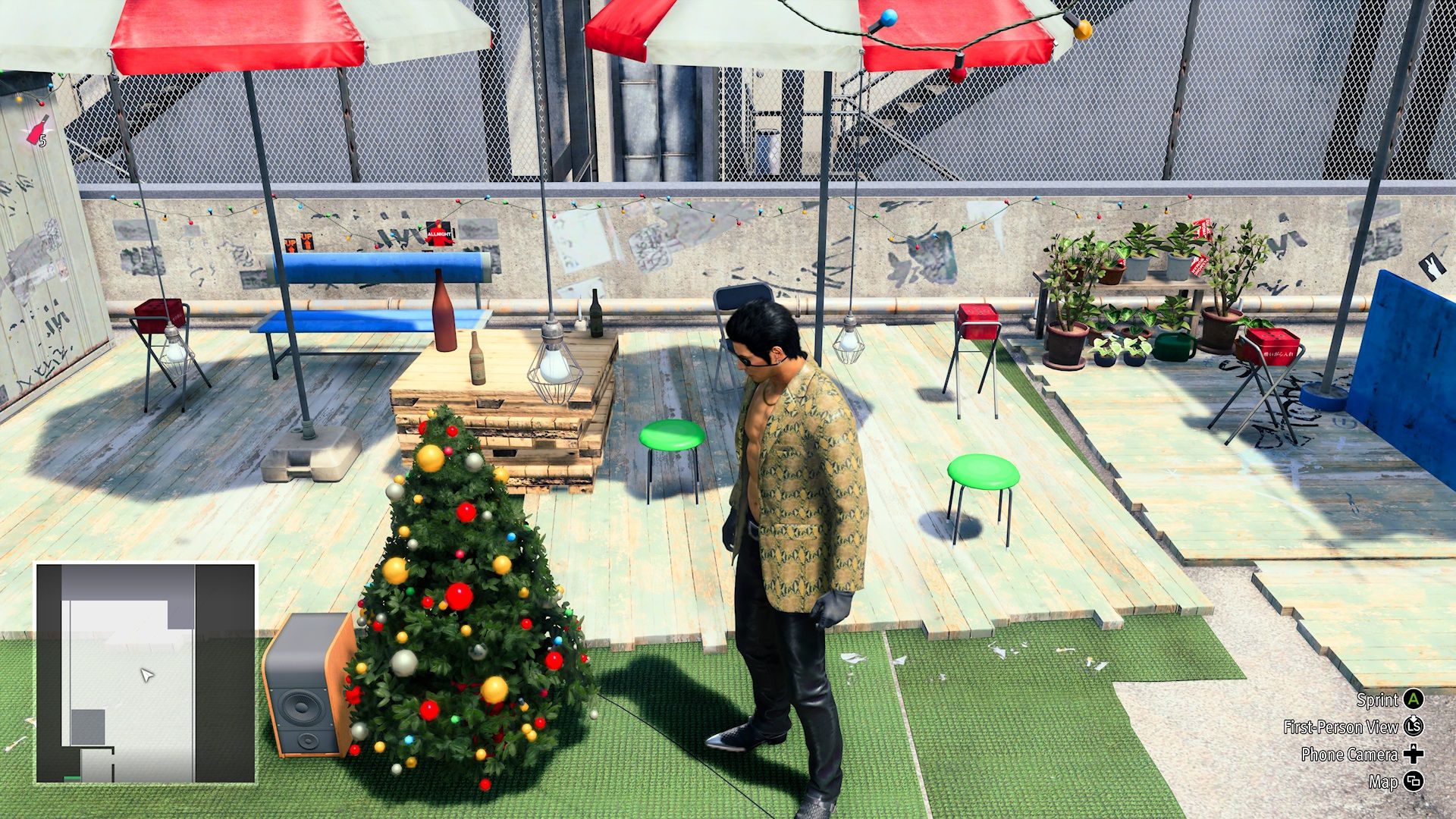 Kiryu looking at a Christmas tree in Like a Dragon Gaiden.