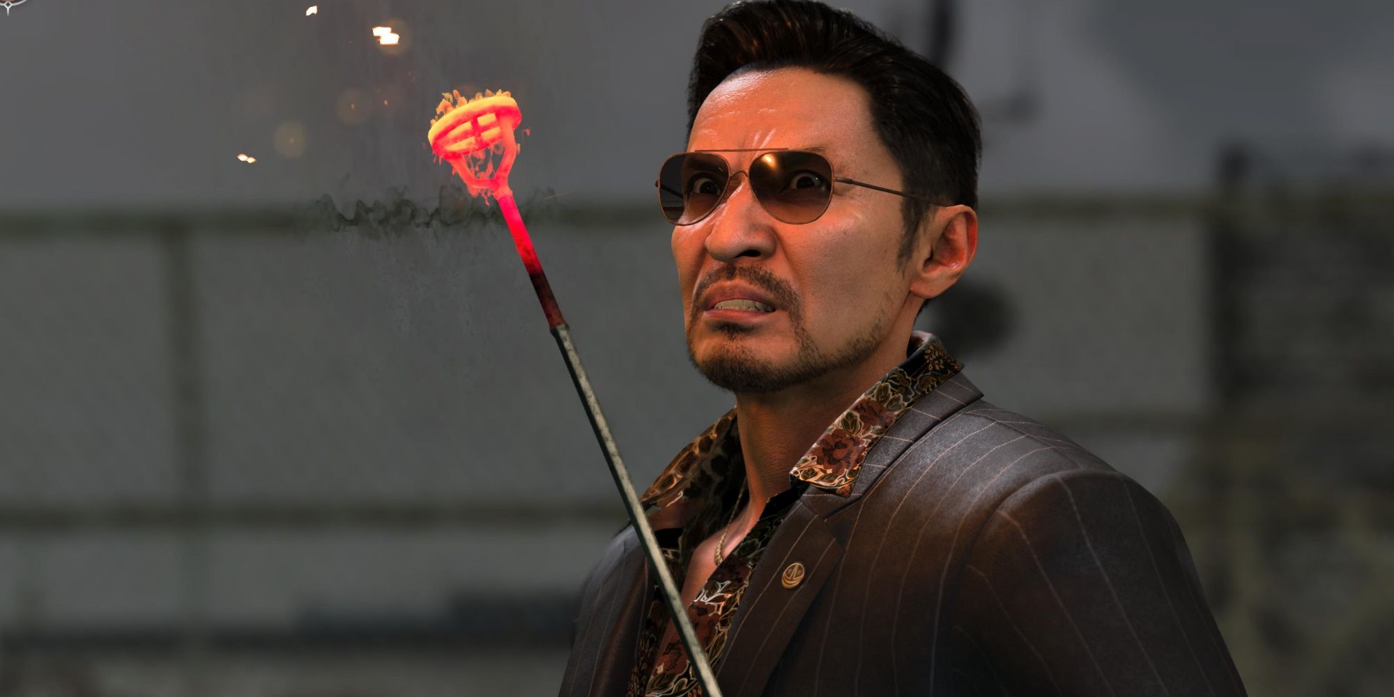 Yuki Tsuruno holds a fire poker in Like a Dragon Gaiden: The Man Who Erased His Name.