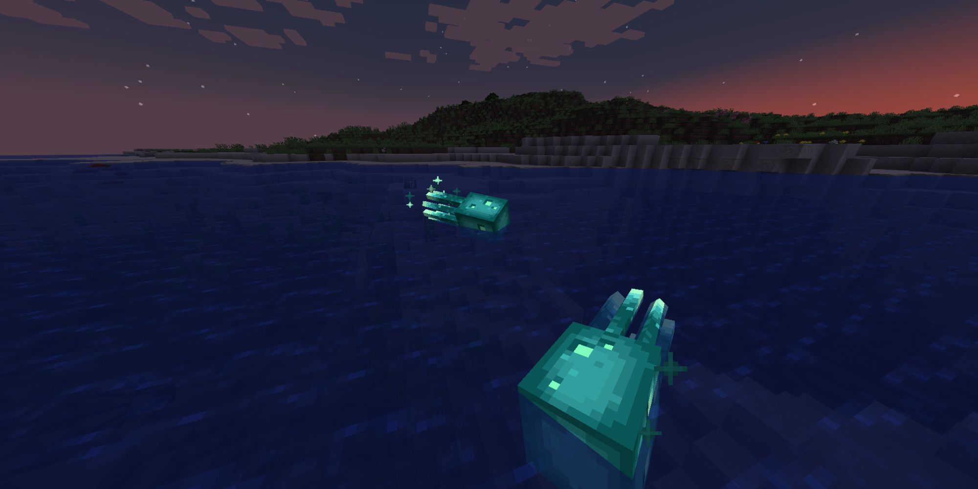 A pair of mostly cyan, sparkly glowsquids swimming in the ocean at night.