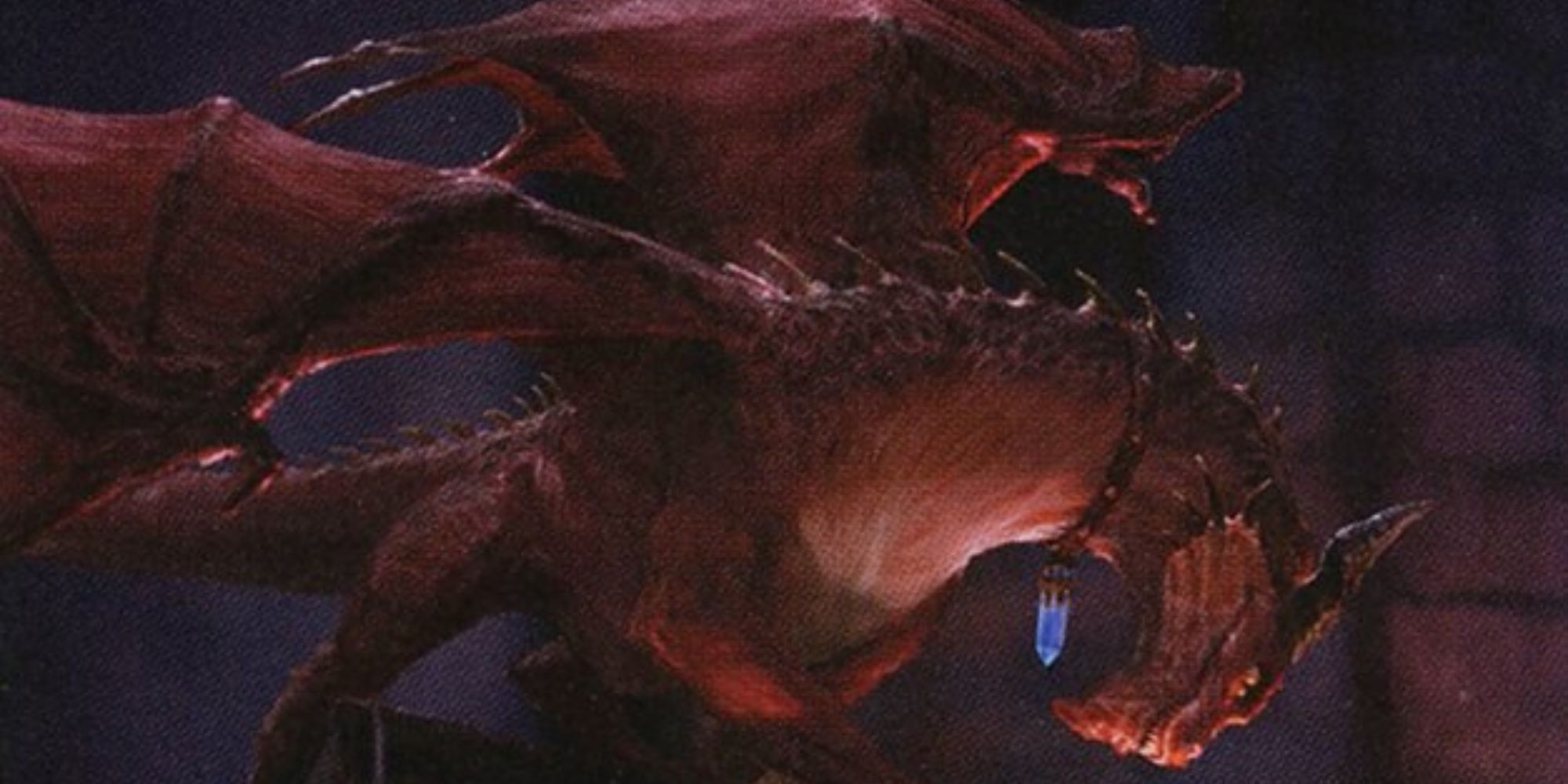 A small dragon wearing a collar with a blue crystal around its neck