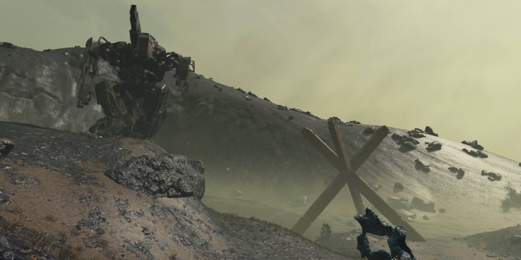 A mech sits on top of a hill in the middle of an old battlefield.