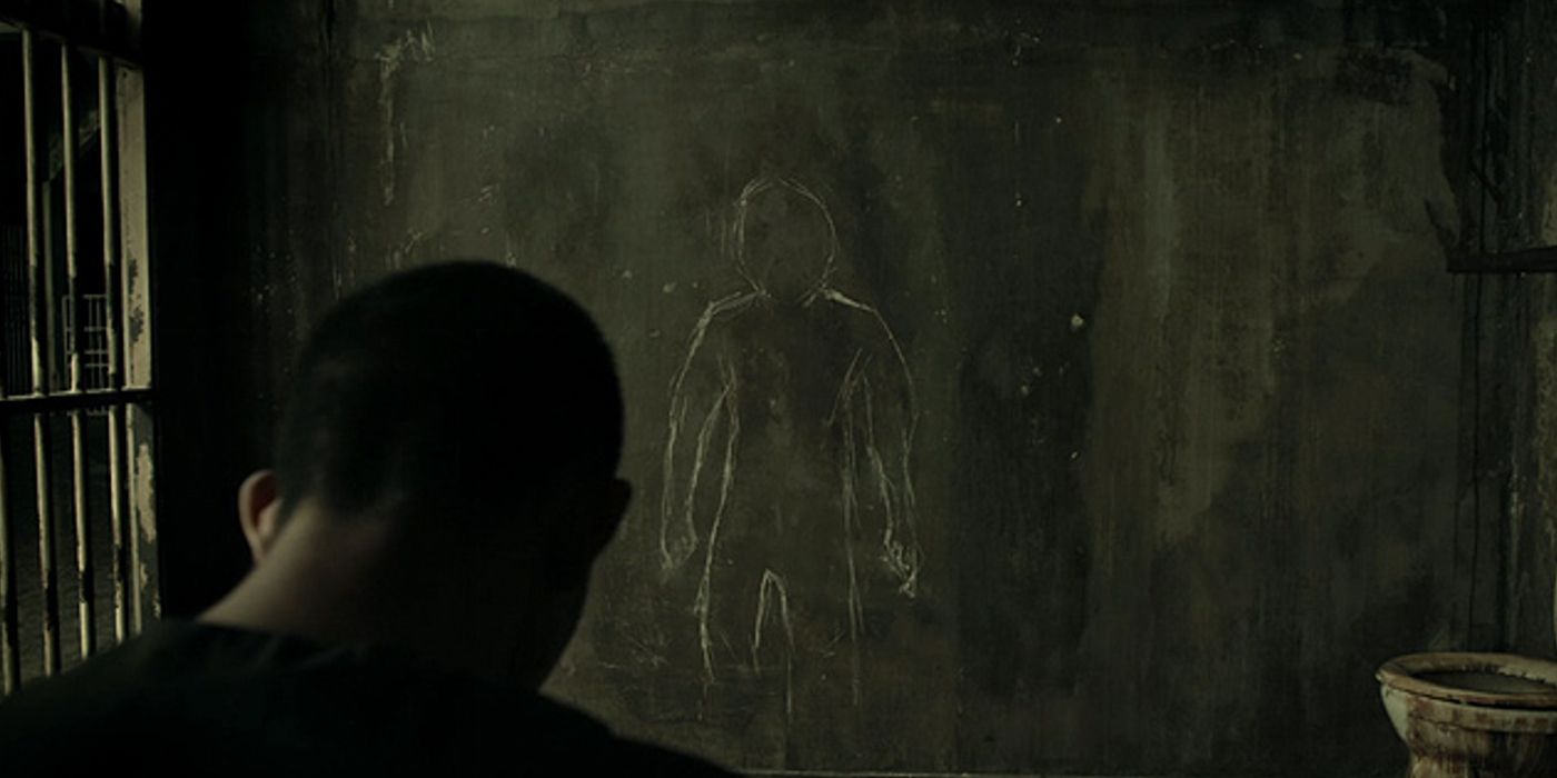 Iko Uwais as Rama in Prison Cell