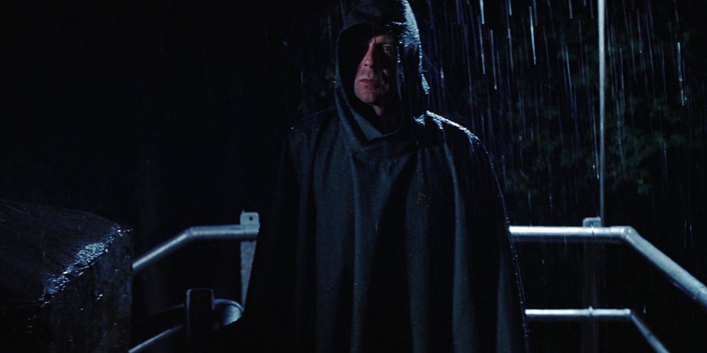 Bruce Willis as David Dunn Standing in Rain