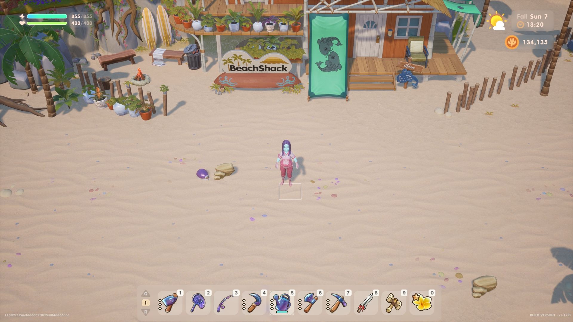 Coral Island avatar standing on the beach. The Beach Shack can be seen in the distance.