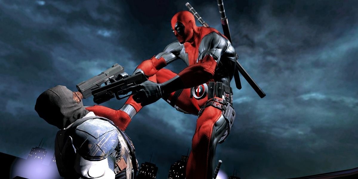 Deadpool holding an enemy on his knees at gunpoint 