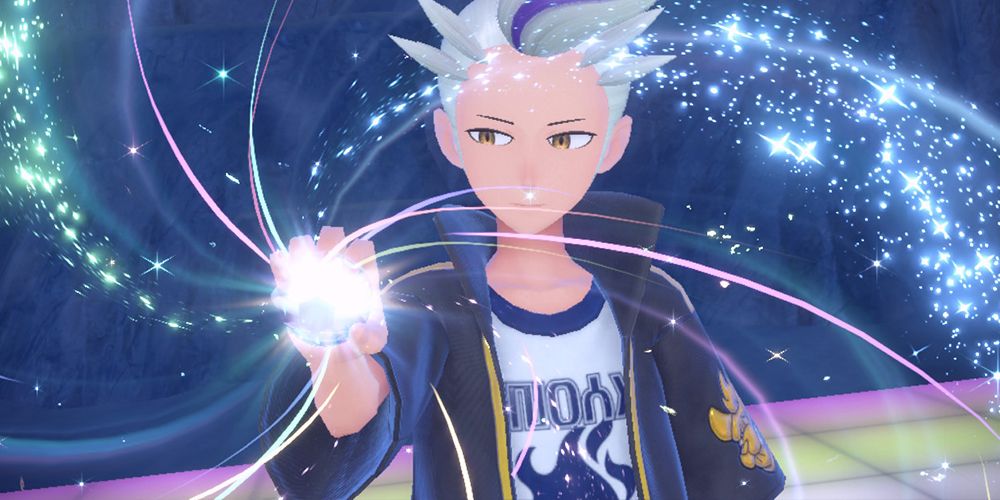 Drayton of the BB League Elite Four smiling as he looks to his tera orb during battle in Pokemon Scarlet & Violet, The Indigo Disk.