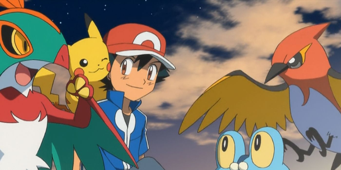 Image of Ash Sitting With His Kalos Pokémon Team