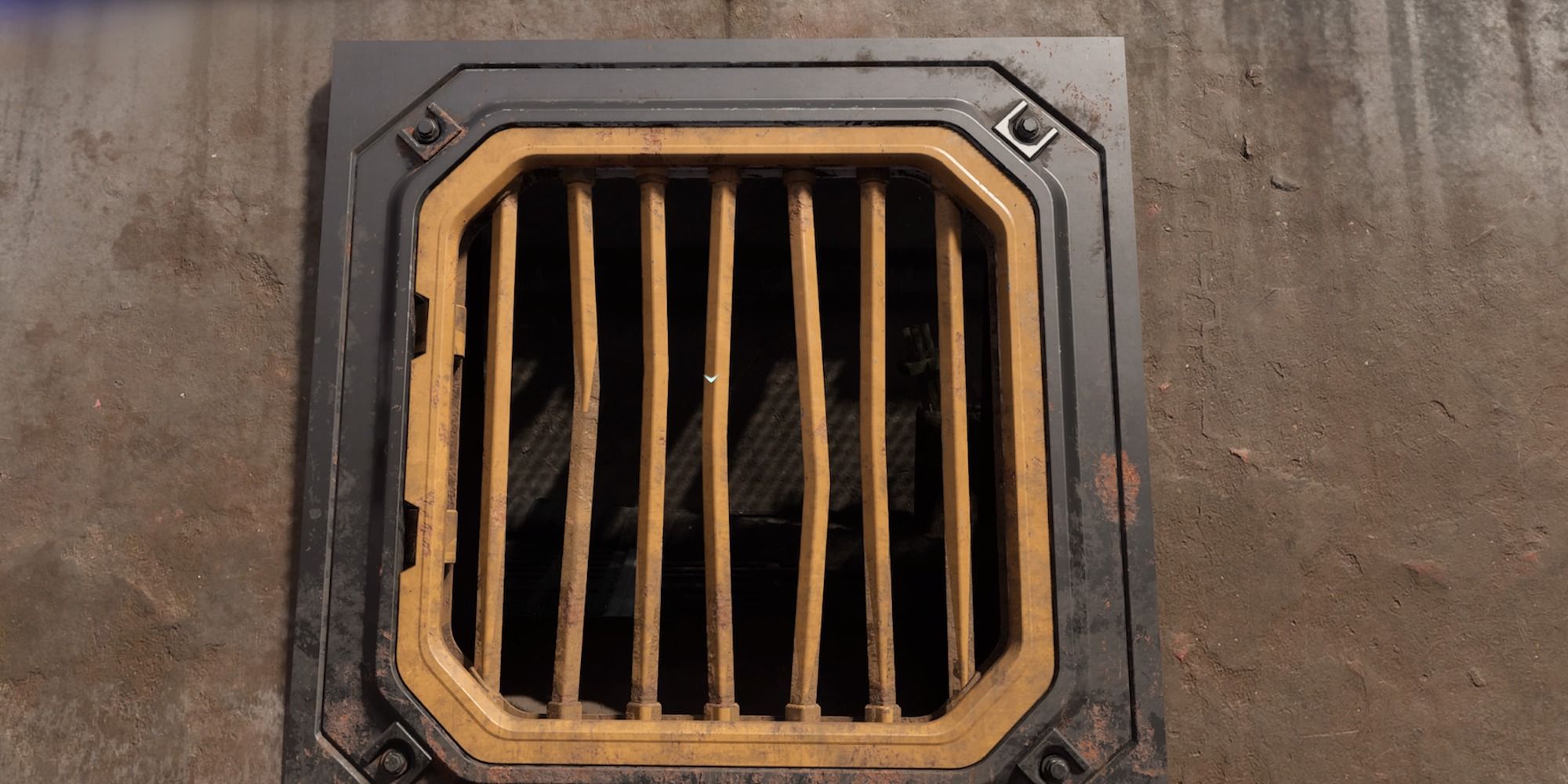 Closeup of yellow grate with bent bars