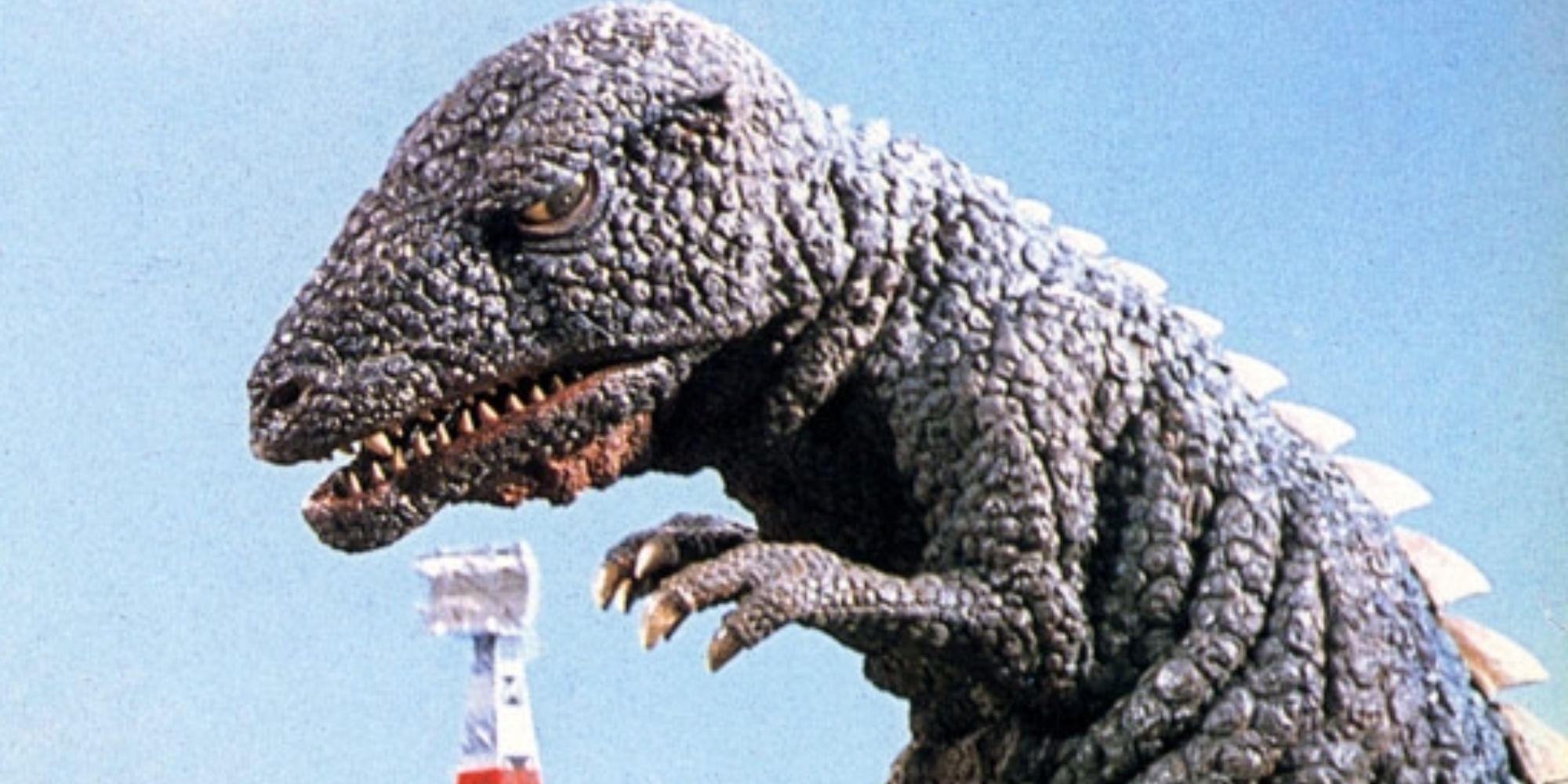 Gorosaurus from godzilla looking at city
