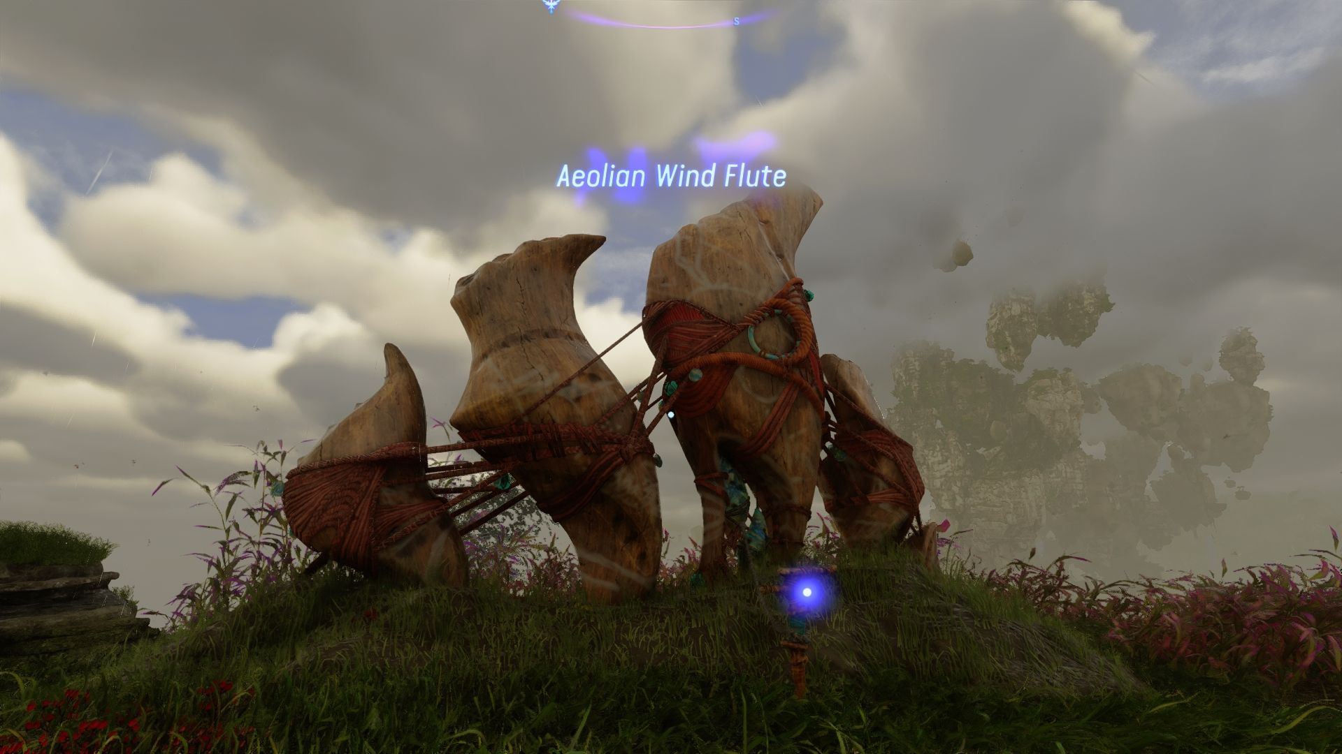 Player standing next to an Aeolian Wind Flute Avatar Frontiers of Pandora