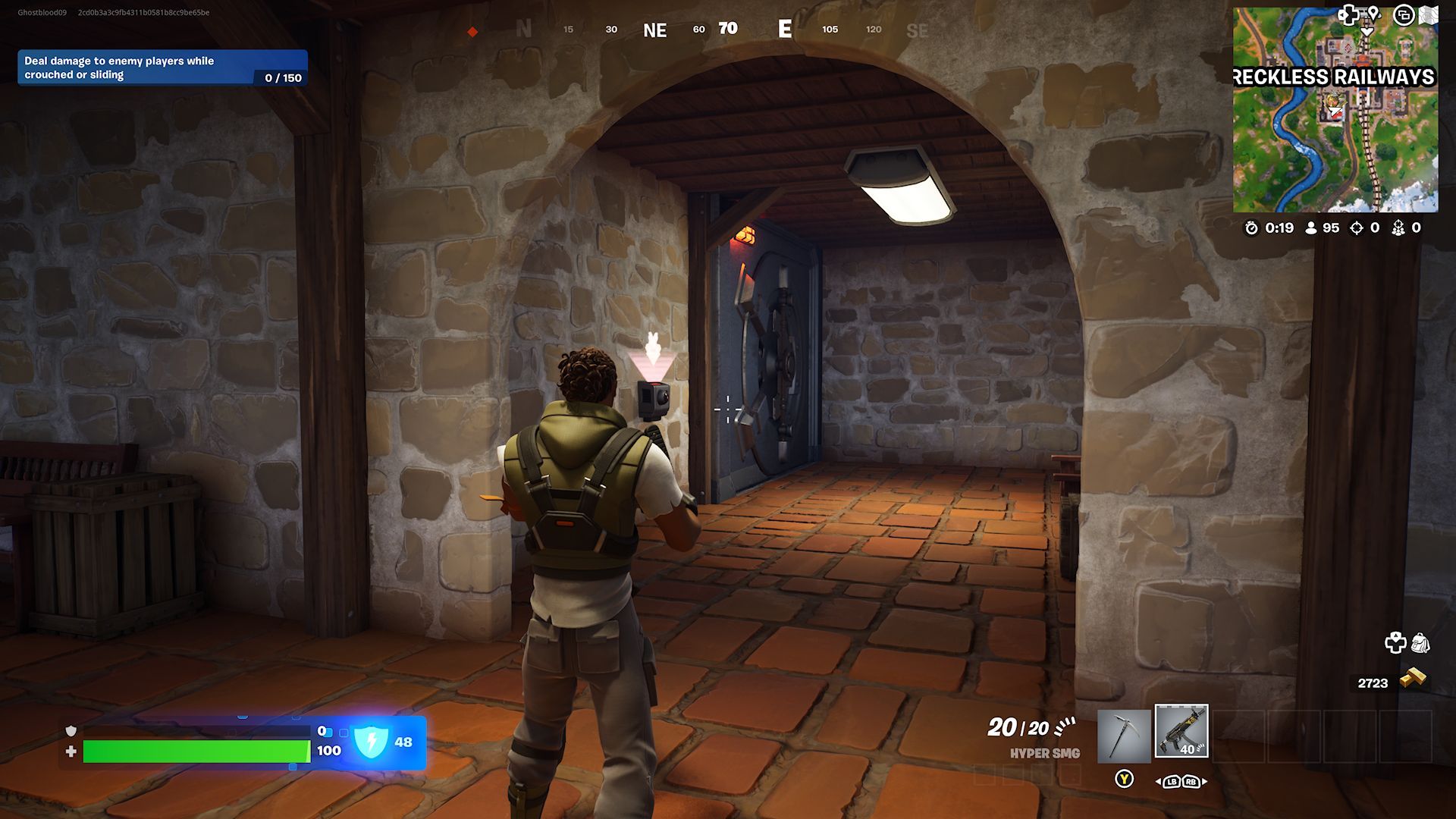 A player standing close to a vault in an underground hallway at Reckless Railways in Fortnite.