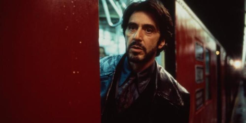 Al Pacino peaking out from a subway car