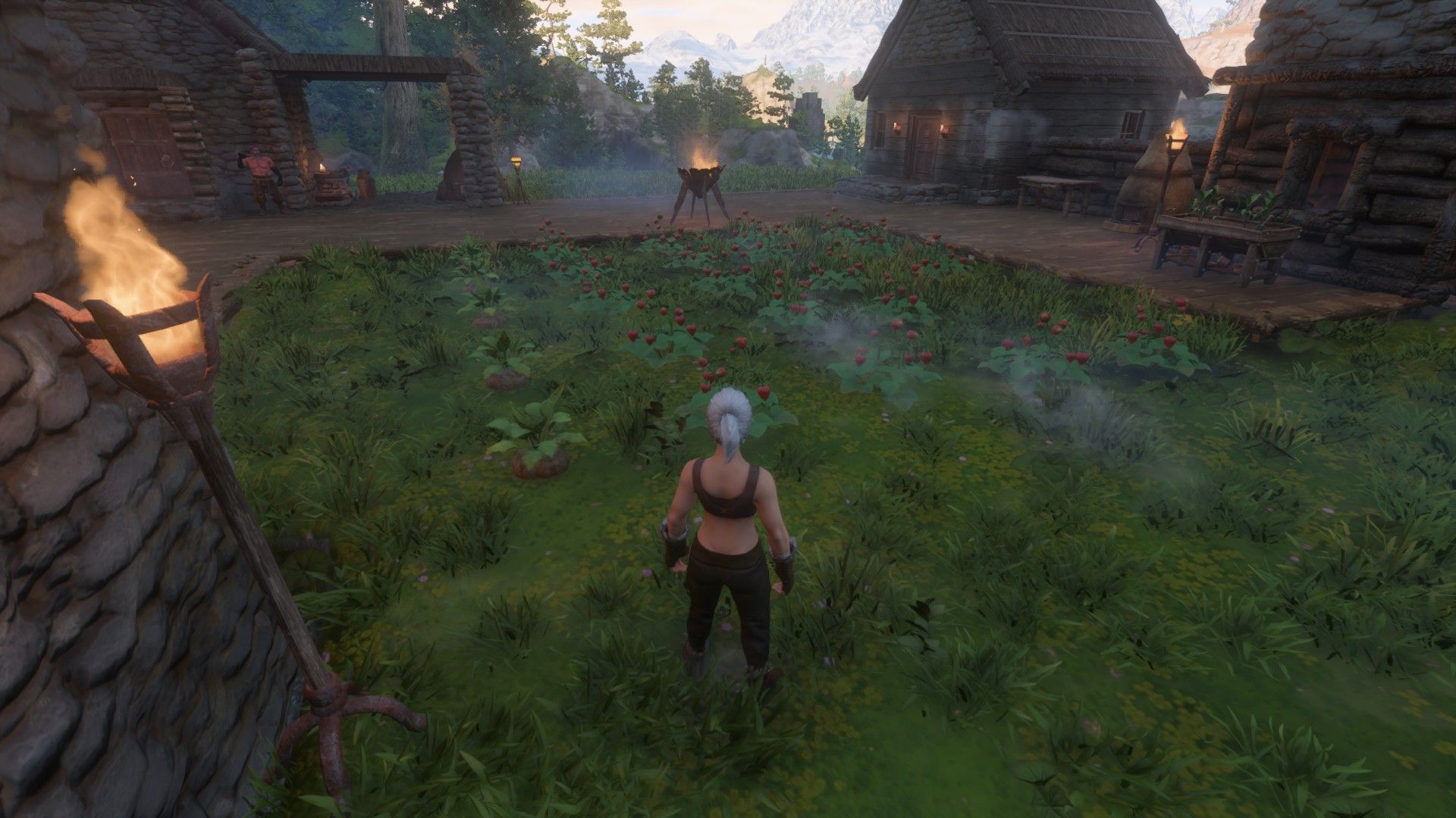 enshrouded player looking at strawberry seedlings