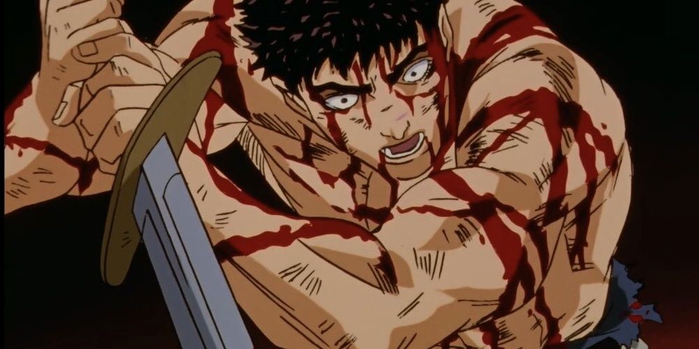 Beserk man with sword covered in blood