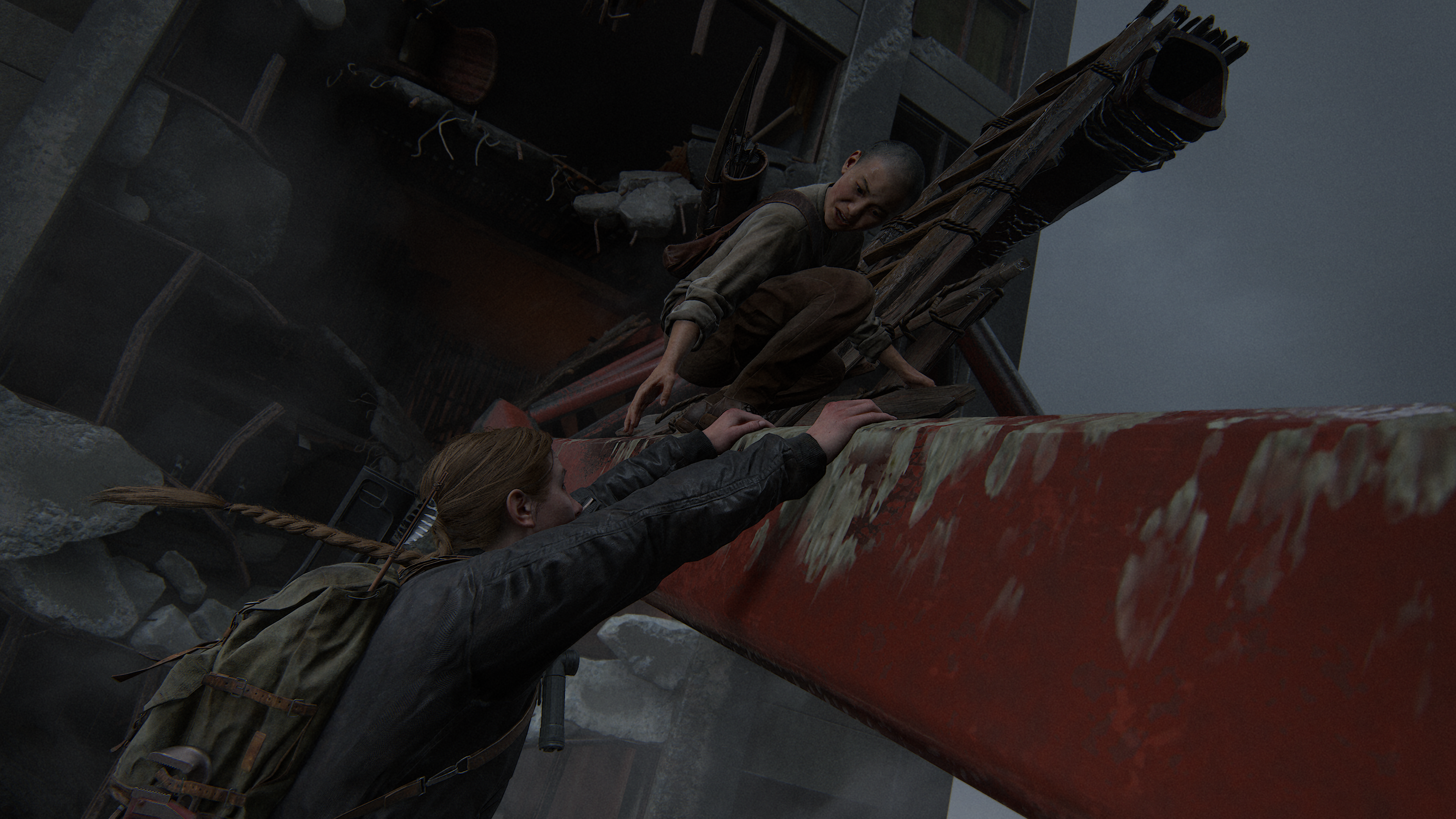 The Last of Us - Lev and Abby hanging from the crane