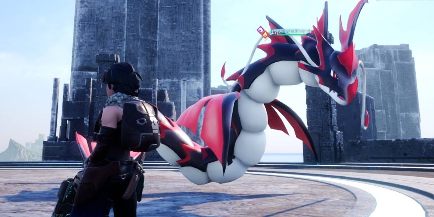 Palworld: Jormuntide Ignis, a black and red serpentine dragon floating through the air as the players watches 