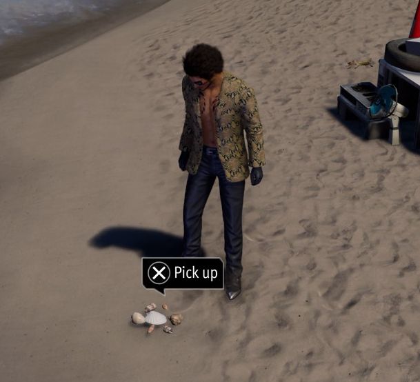 Kasuga beside some shells in Like a Dragon Infinite Wealth.