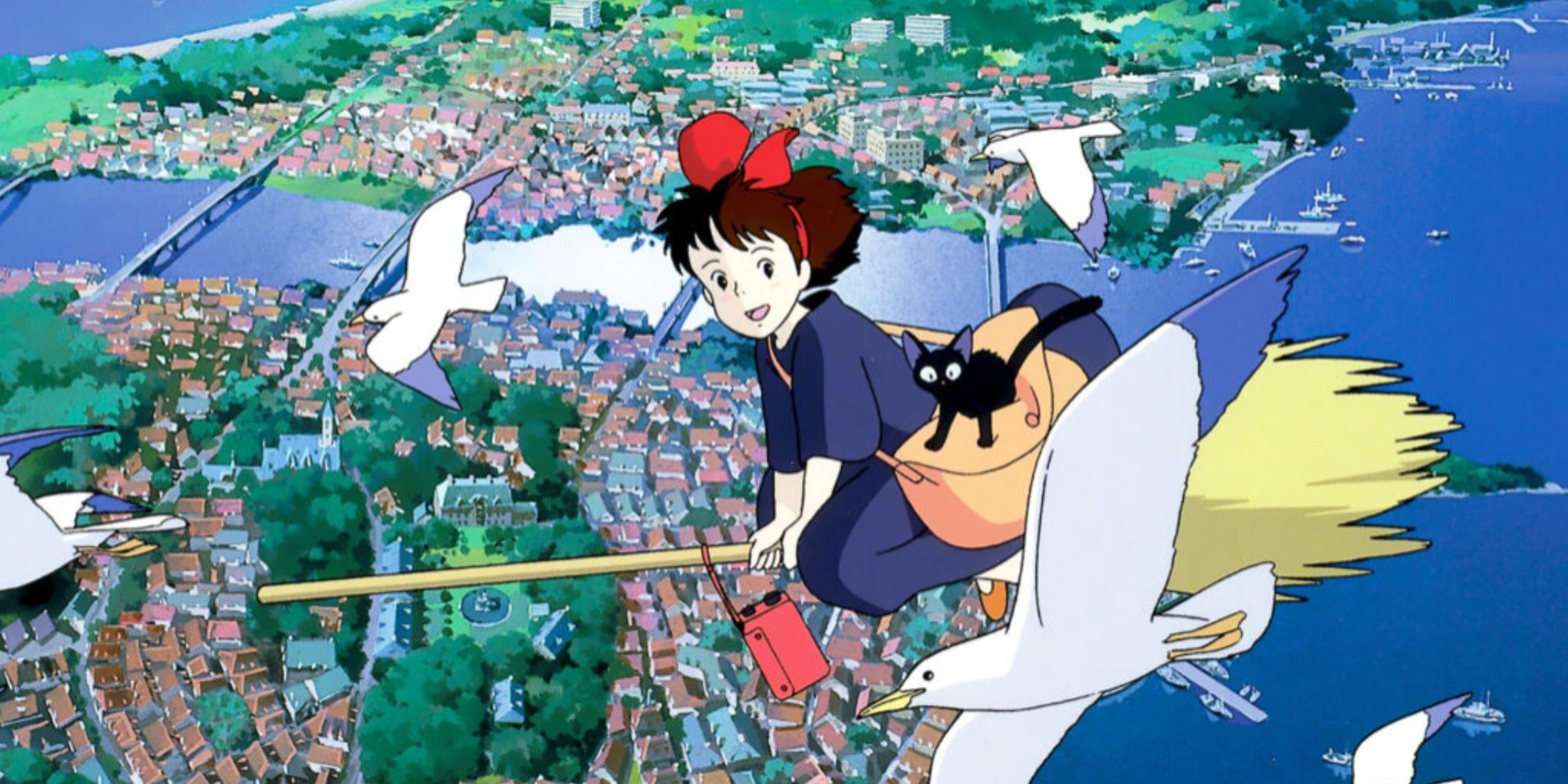 Kiki and Jiji flying on her broomstick next to seagulls in Kiki's Delivery Service