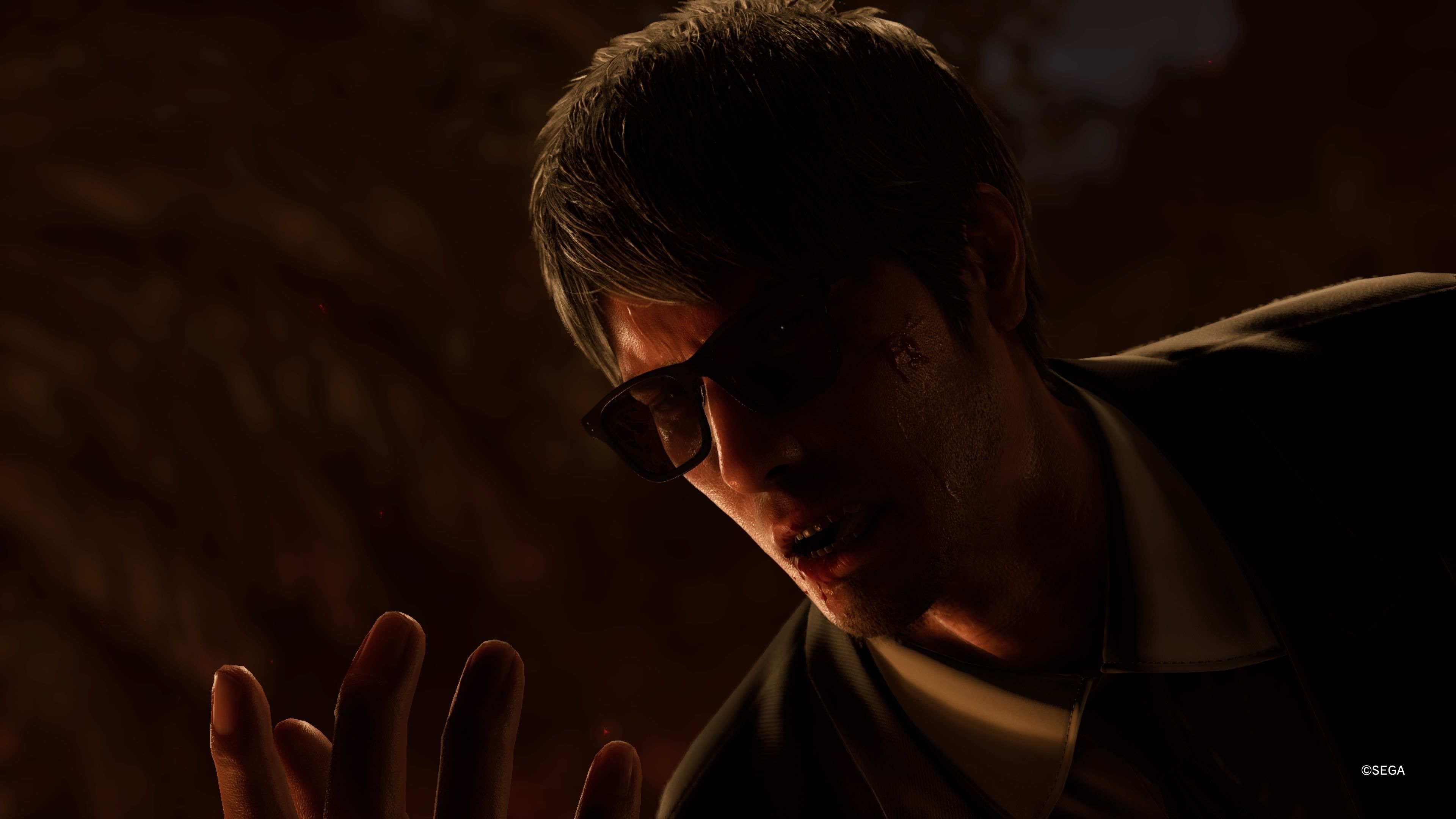 Kiryu coughing up blood in Like a Dragon Infinite Wealth.