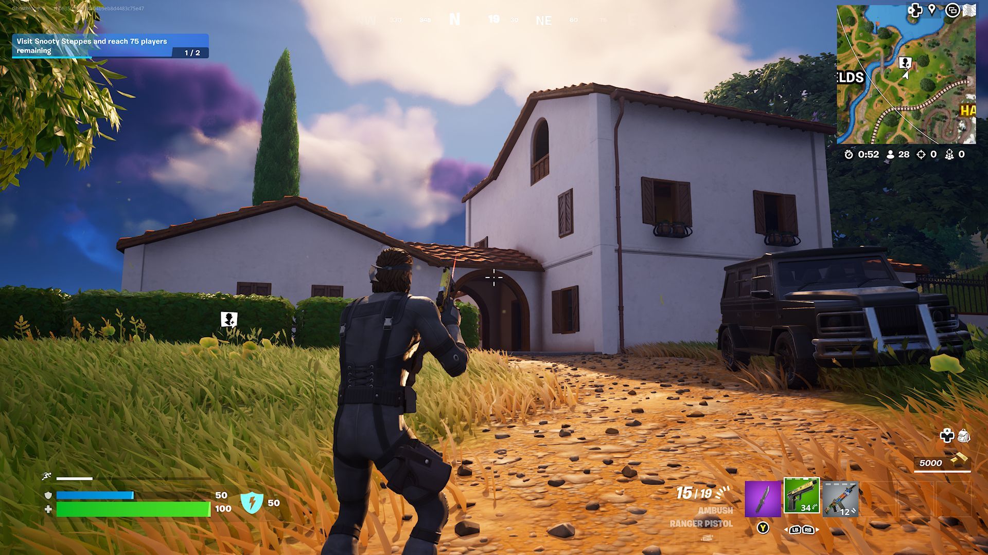 A player standing on the pathway leading up to the Lil' Villa POI in Fortnite.