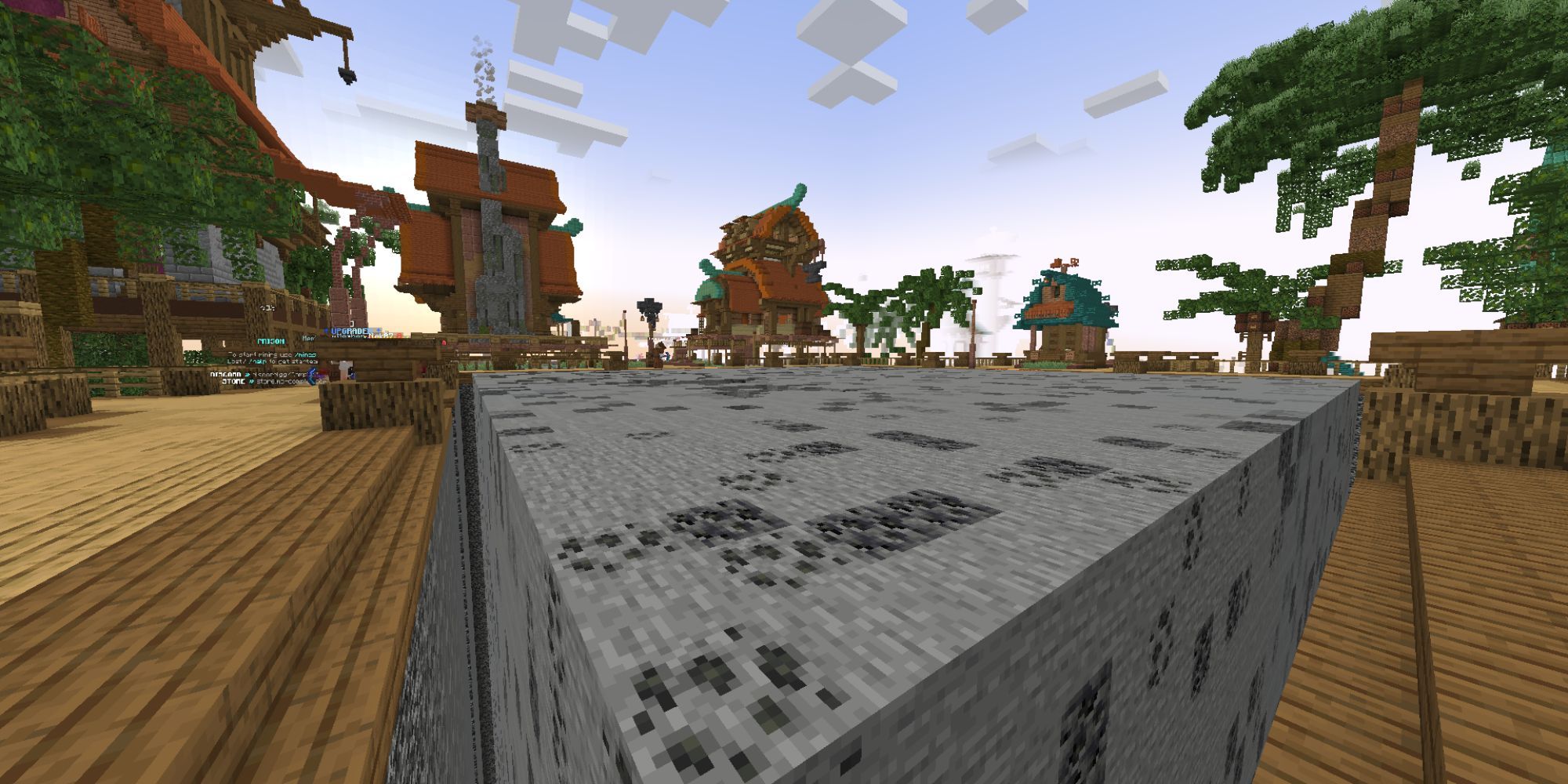 A public mine in the middle of a tropical town with coal and stone blocks.