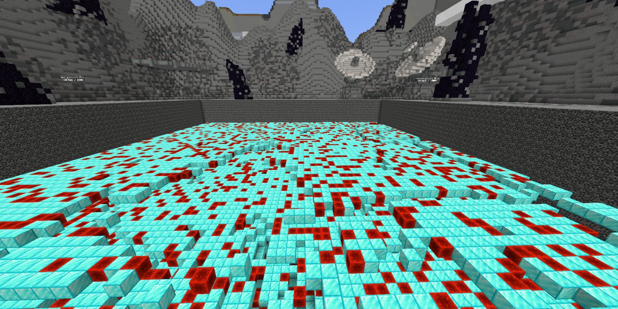 A massive mining pit full of solid, shiny Redstone and Diamond blocks.