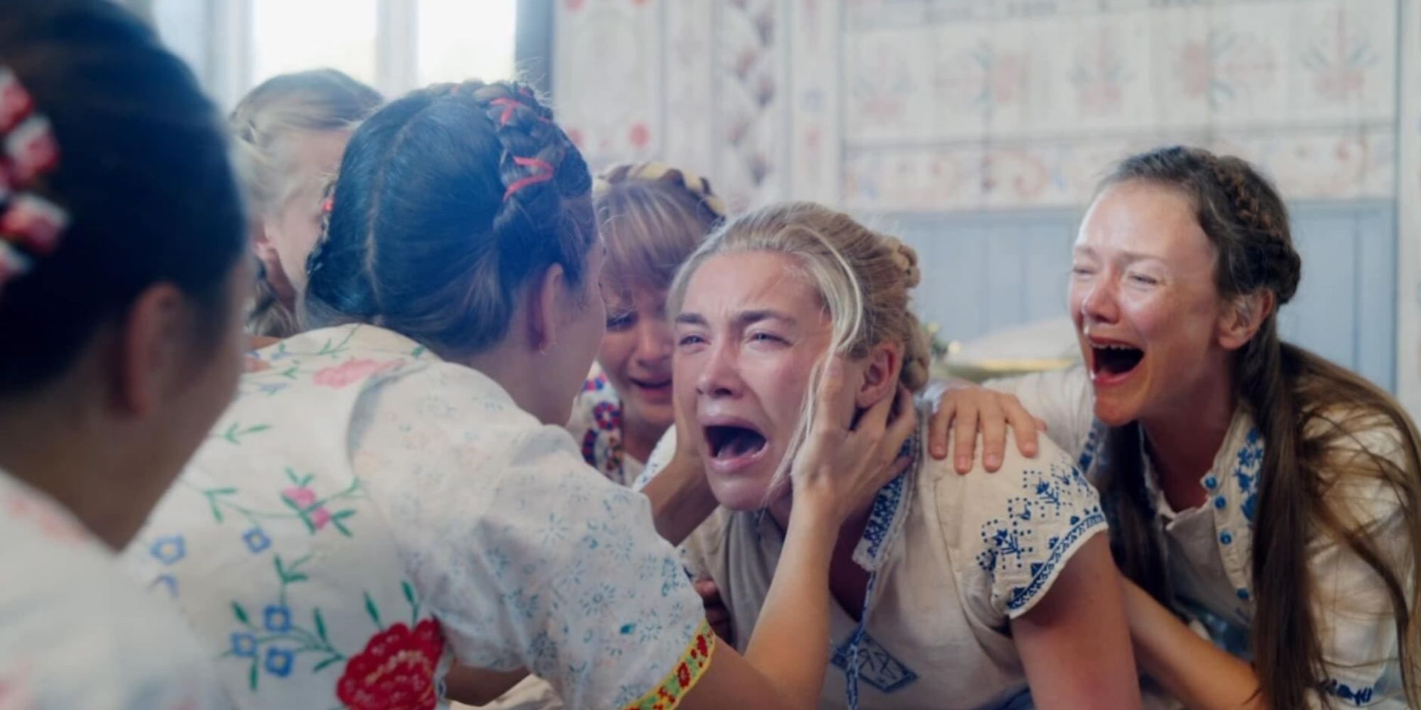 The bone-chilling scene where Florence Pugh's Dani collectively cries in a group in unison with other girls from the village.
