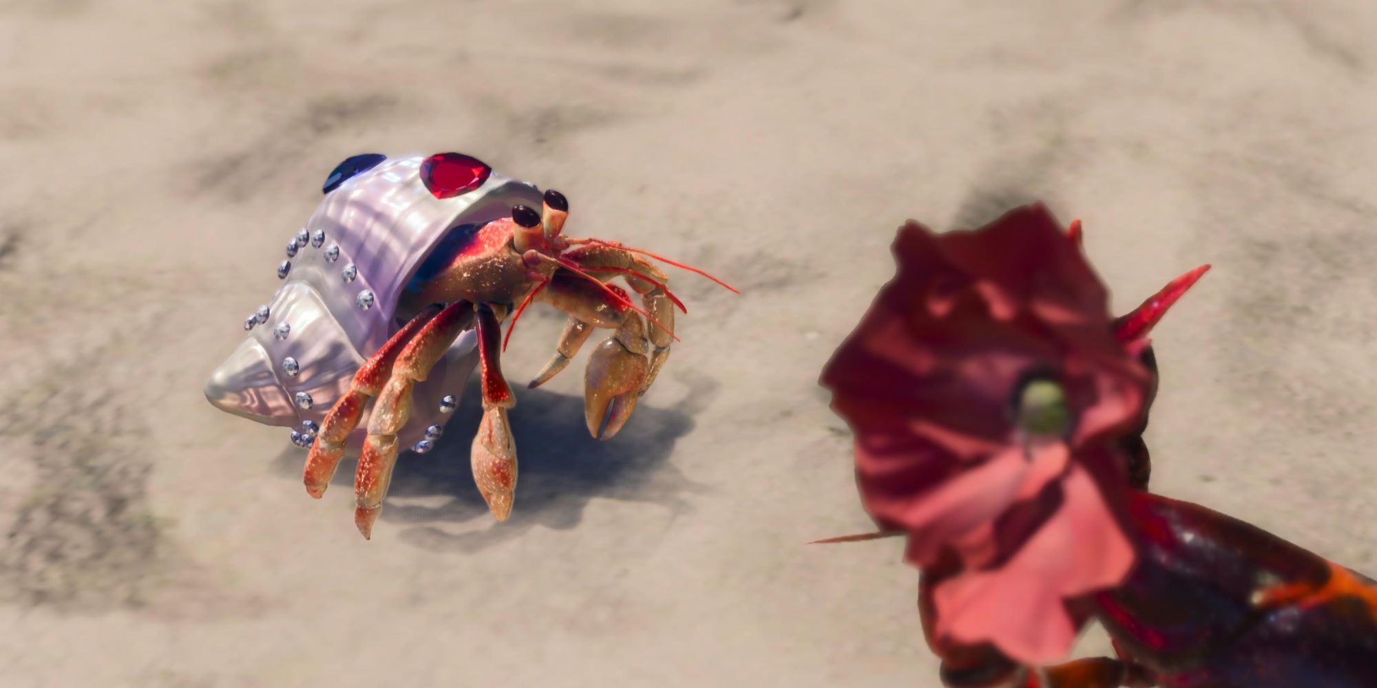 Nancy holding up a flower for Olivia in her bejewelled shell