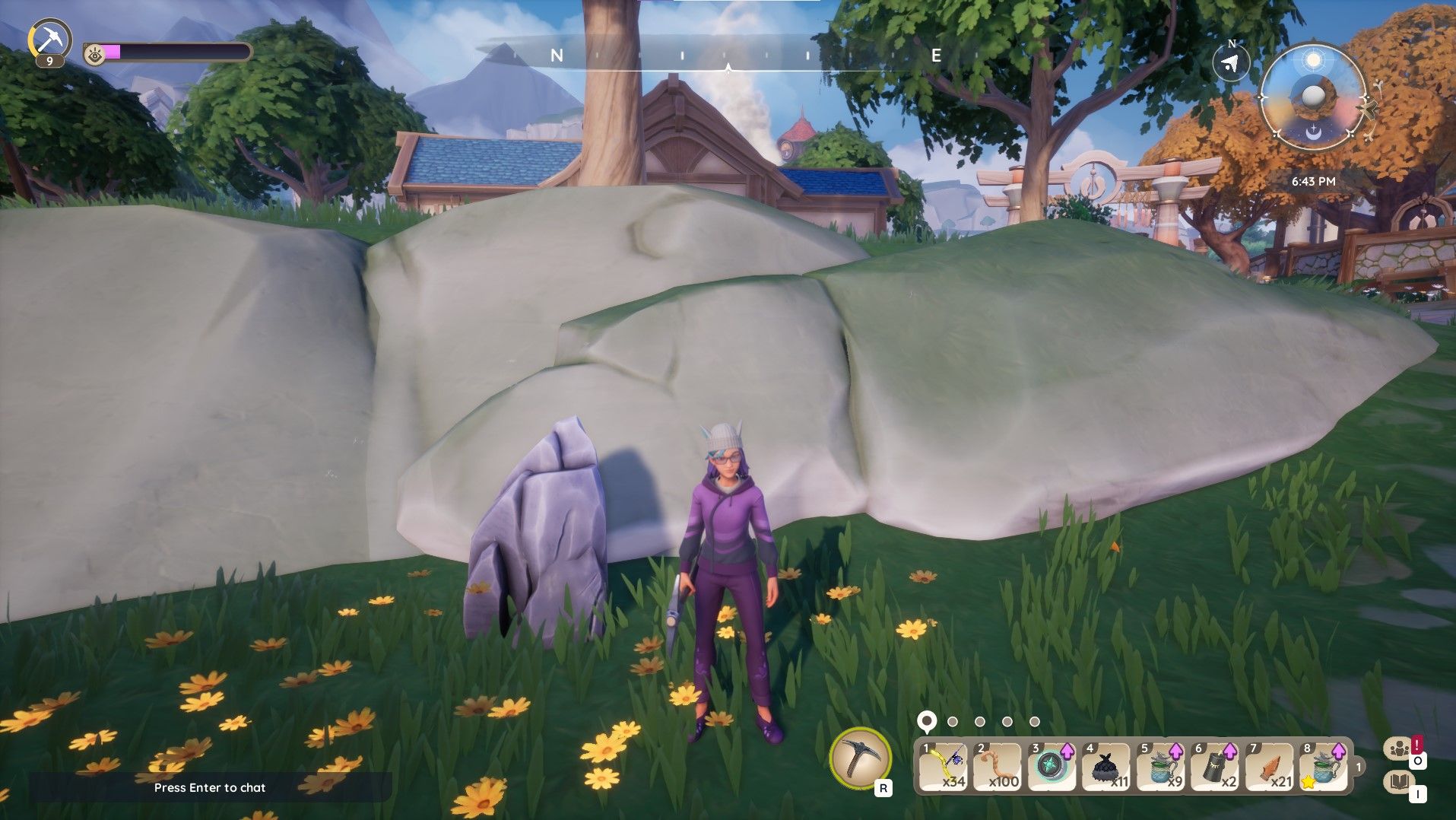 Palia avatar standing next to a large rock mining node.