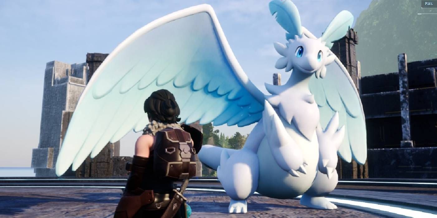 Palworld: Quivern, a feathered white dragon looking happy at the camera as the player character walks to it